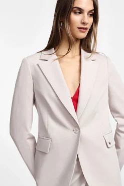 Blazer con bottone e tasche a pattina