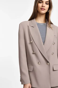 Blazer con bottoni doppi e tasche