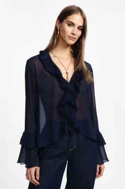 Blusa con maniche lunghe e volant