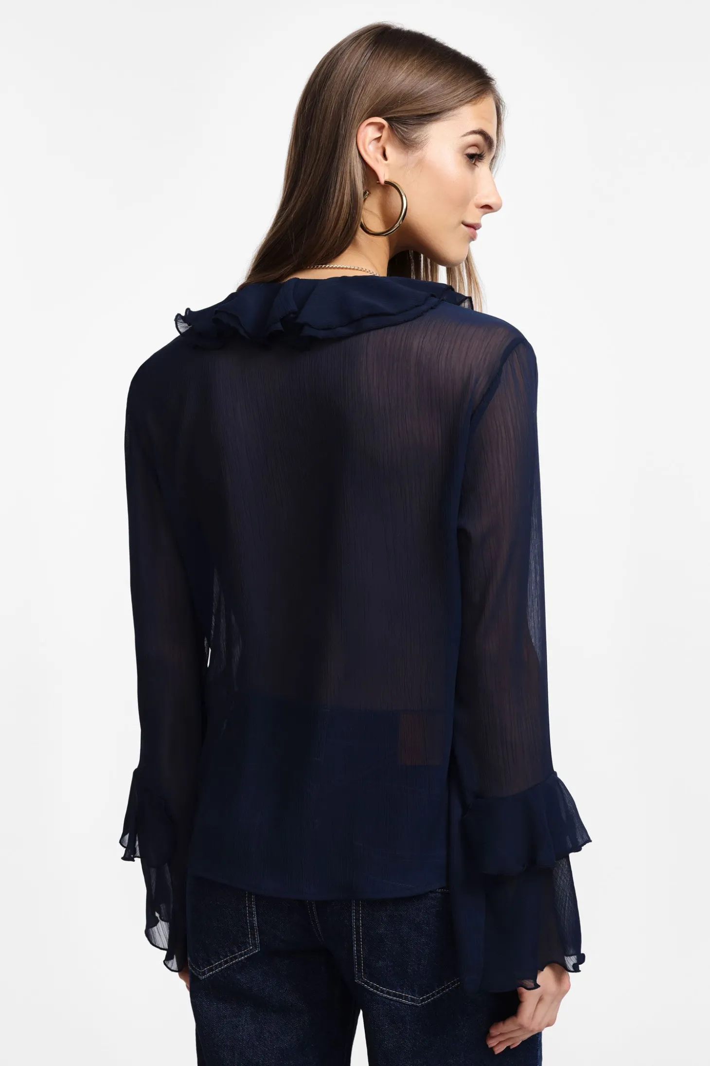 Blusa con maniche lunghe e volant