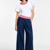 Jeans a gamba larga con elastico a righe