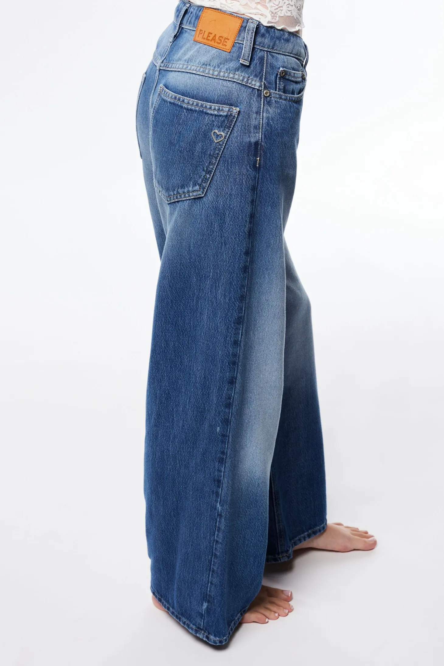 Jeans a gamba larga con lavaggio