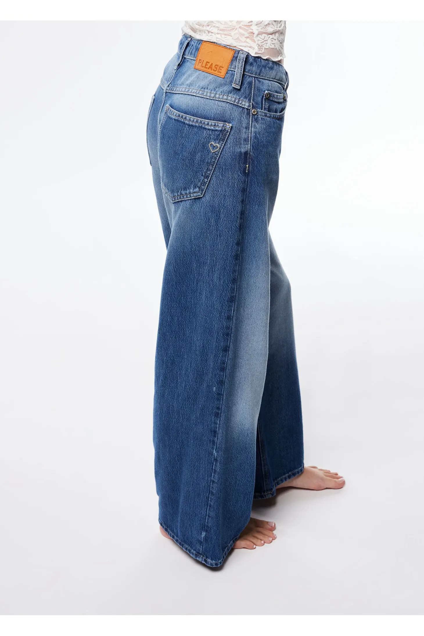 Jeans a gamba larga con lavaggio