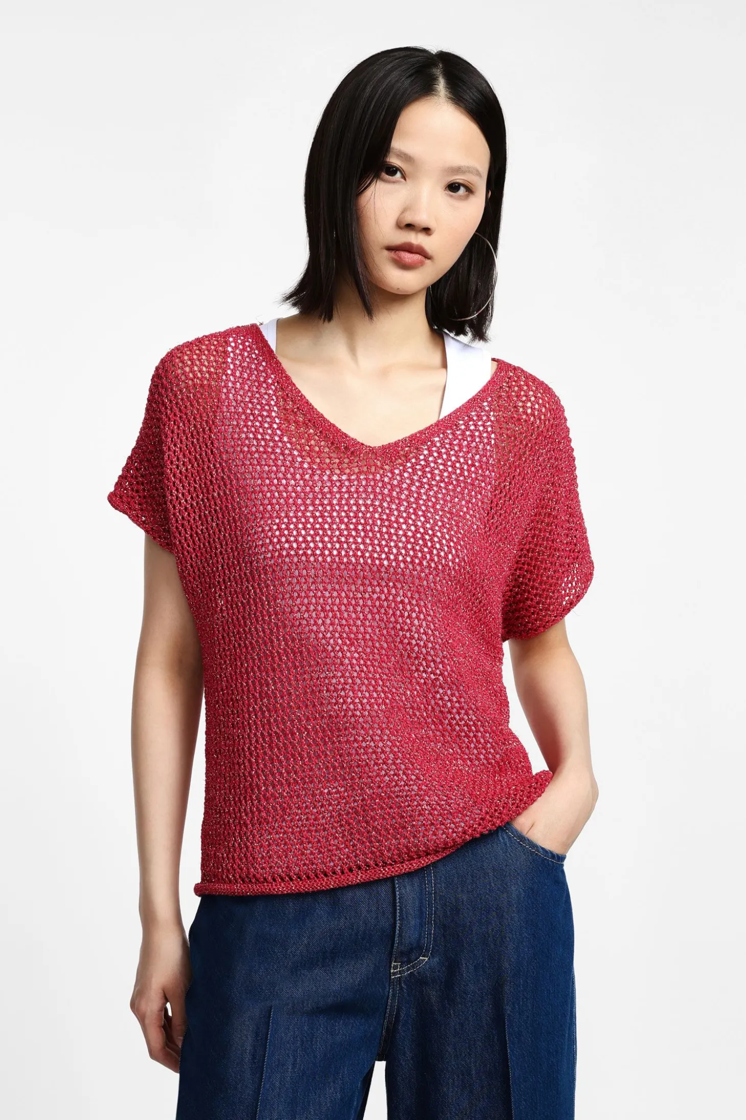 Maglione corto traforato con maniche corte