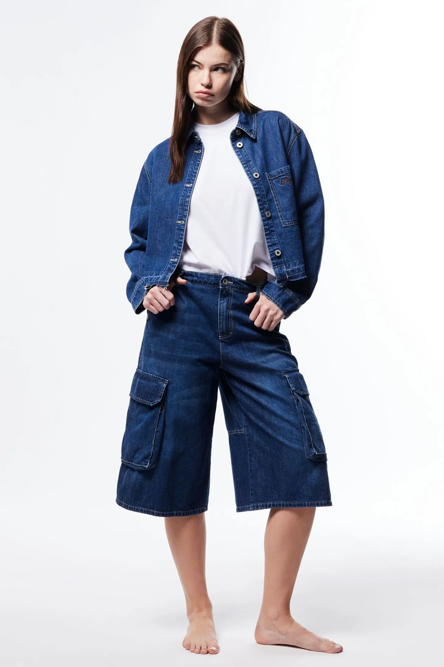 Pantaloncini a ginocchio in denim con tasche