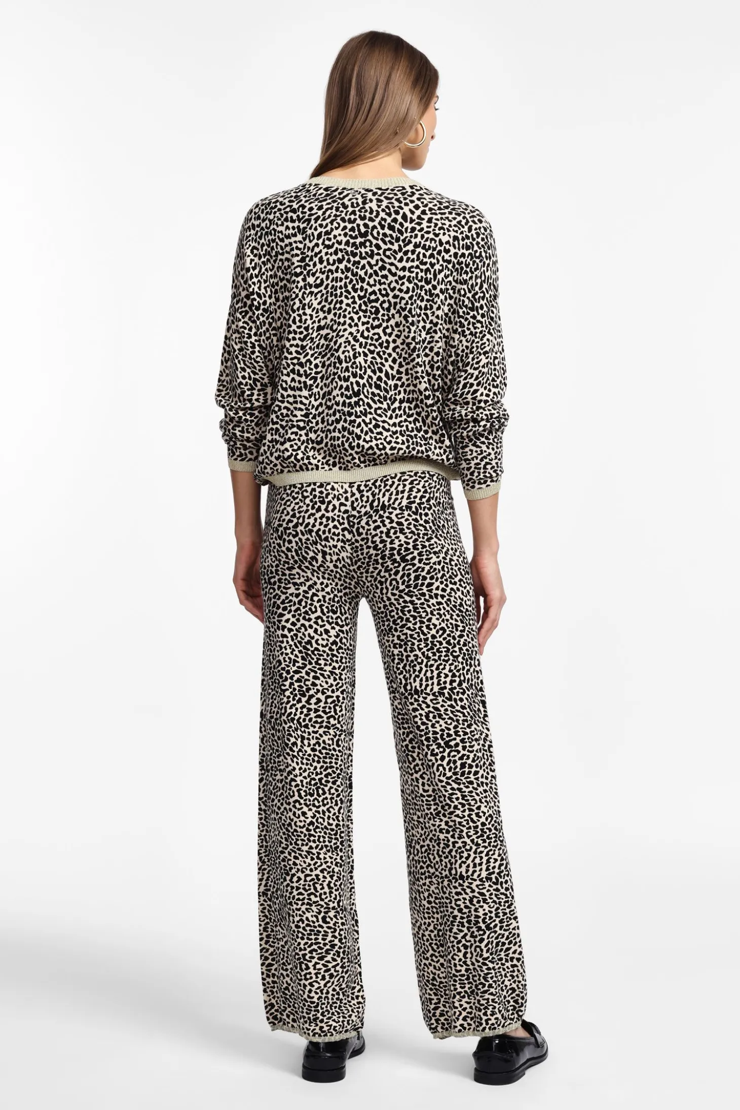 Pantaloni a zampa stampa animalier