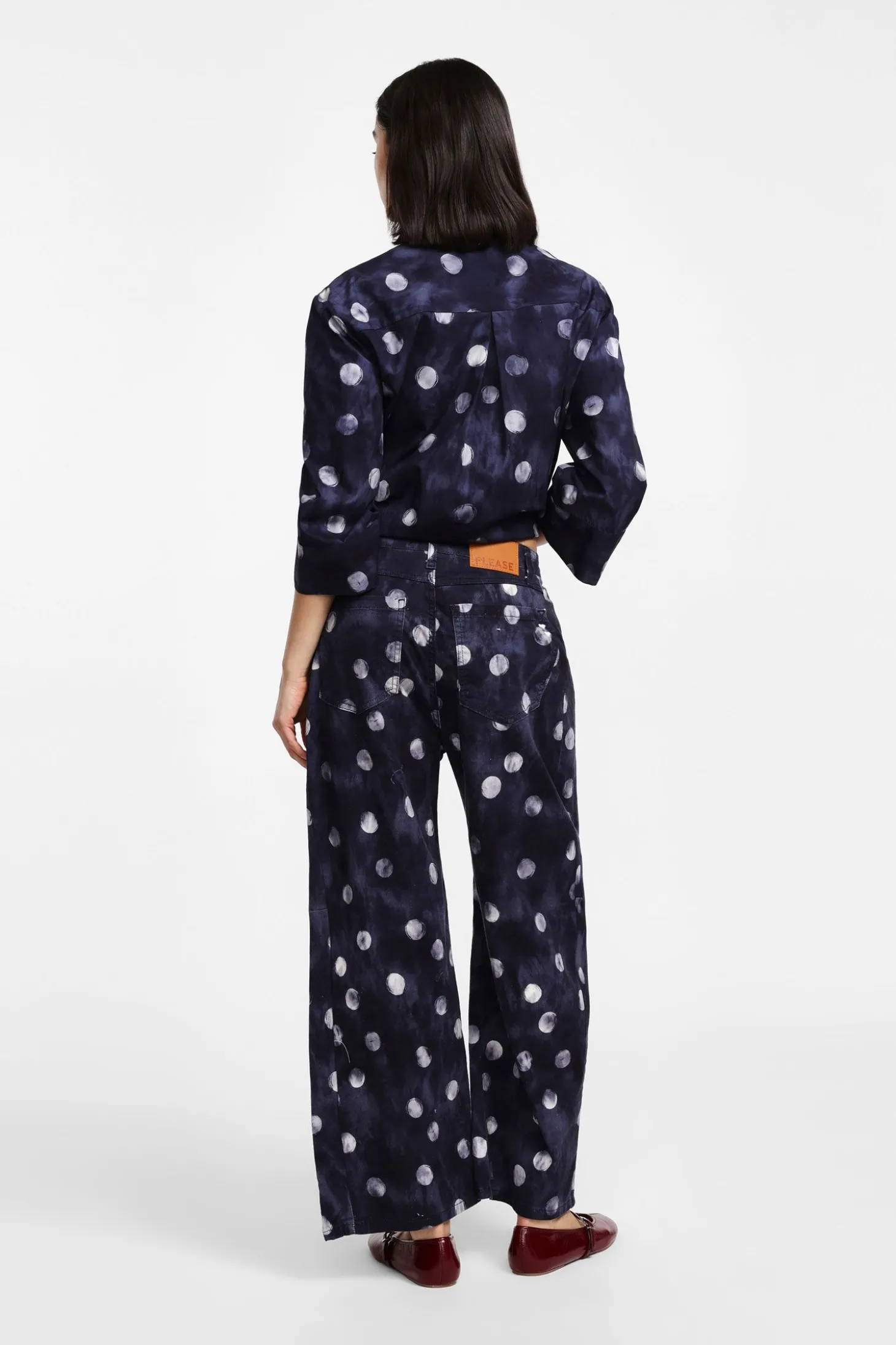 Pantaloni ampi con stampa pois