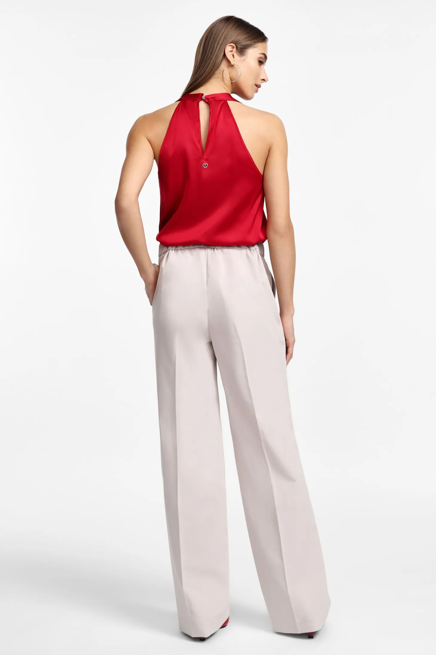 Pantaloni ampi vita alta con chiusura asimmetrica
