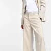 Pantaloni gessati con gamba ampia
