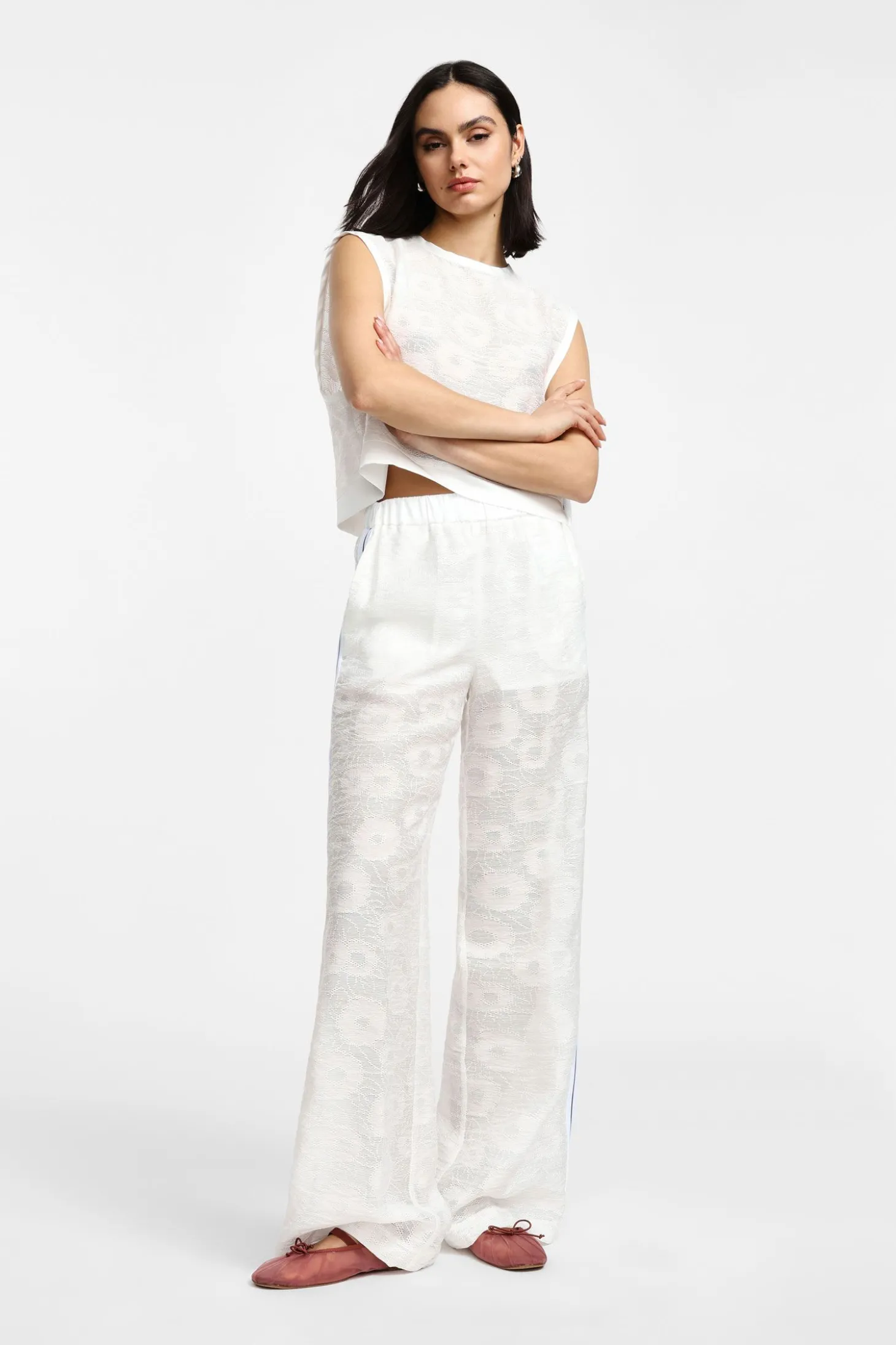 Pantaloni palazzo in pizzo con culotte