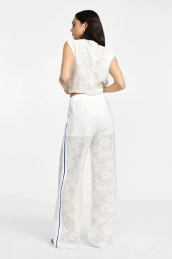 Pantaloni palazzo in pizzo con culotte