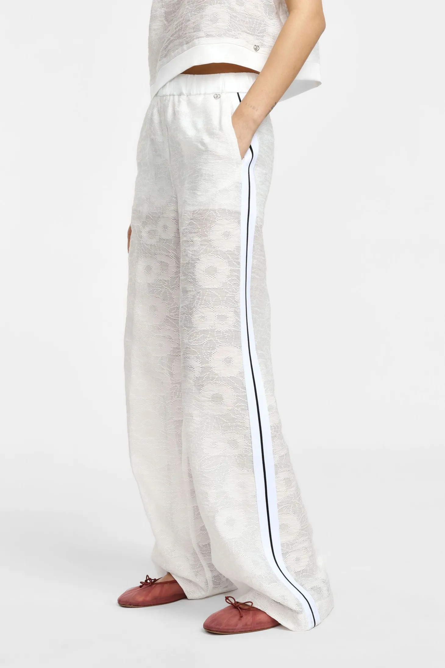 Pantaloni palazzo in pizzo con culotte
