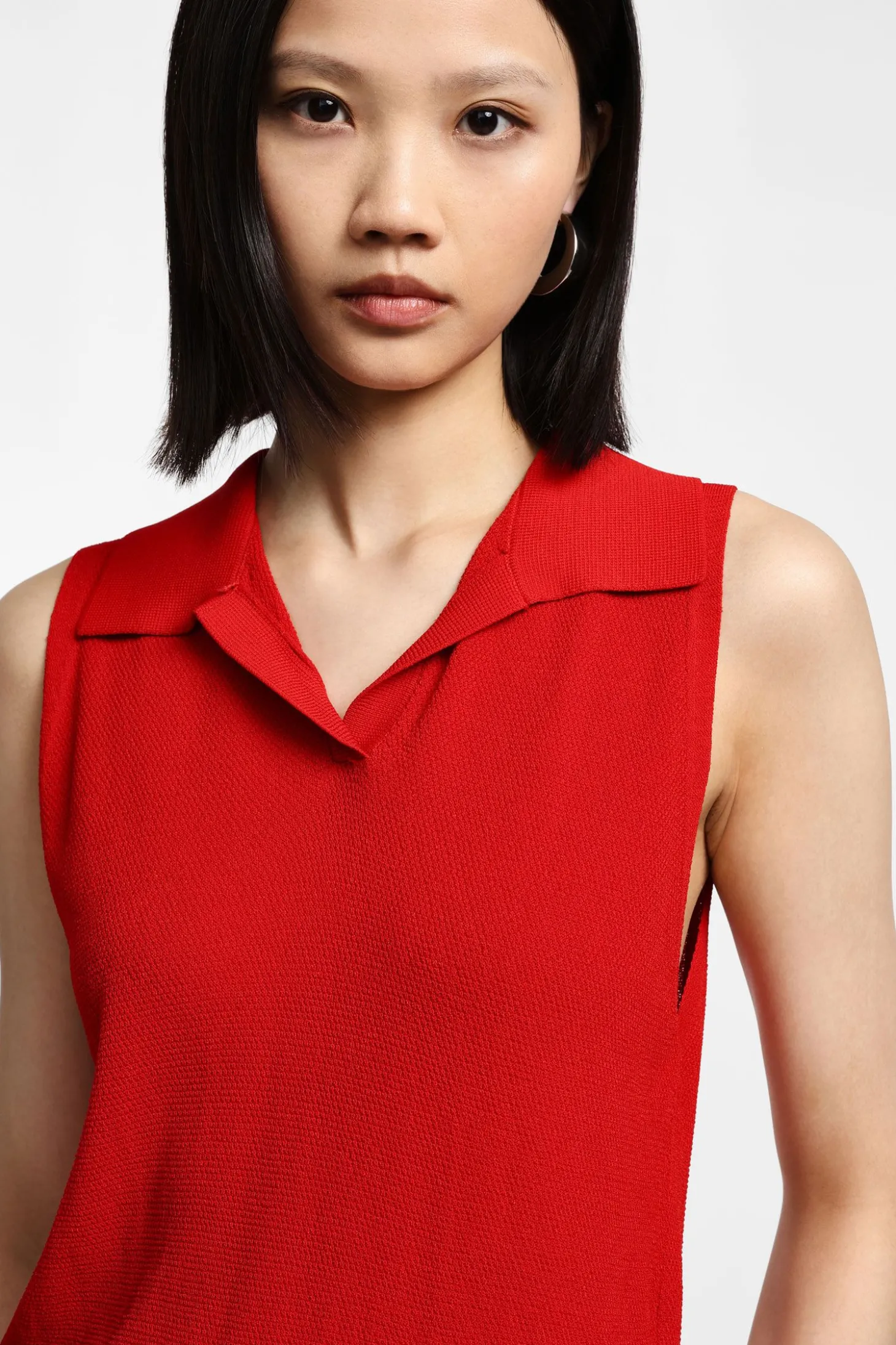 Top in maglia senza maniche con collo polo